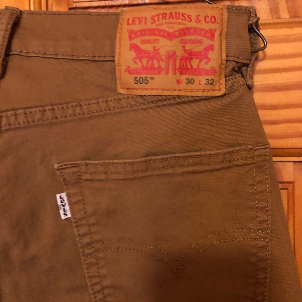 Men’s Levi 505 jeans, brown.
